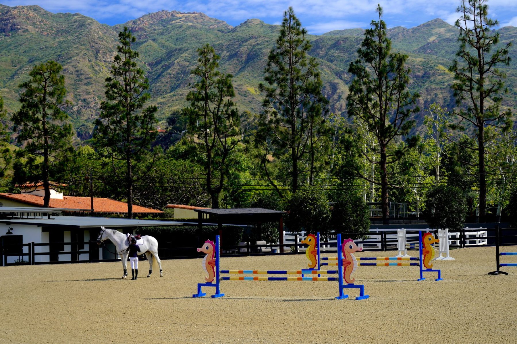 Grand Prix arena framed by the Santa Monica Mountains